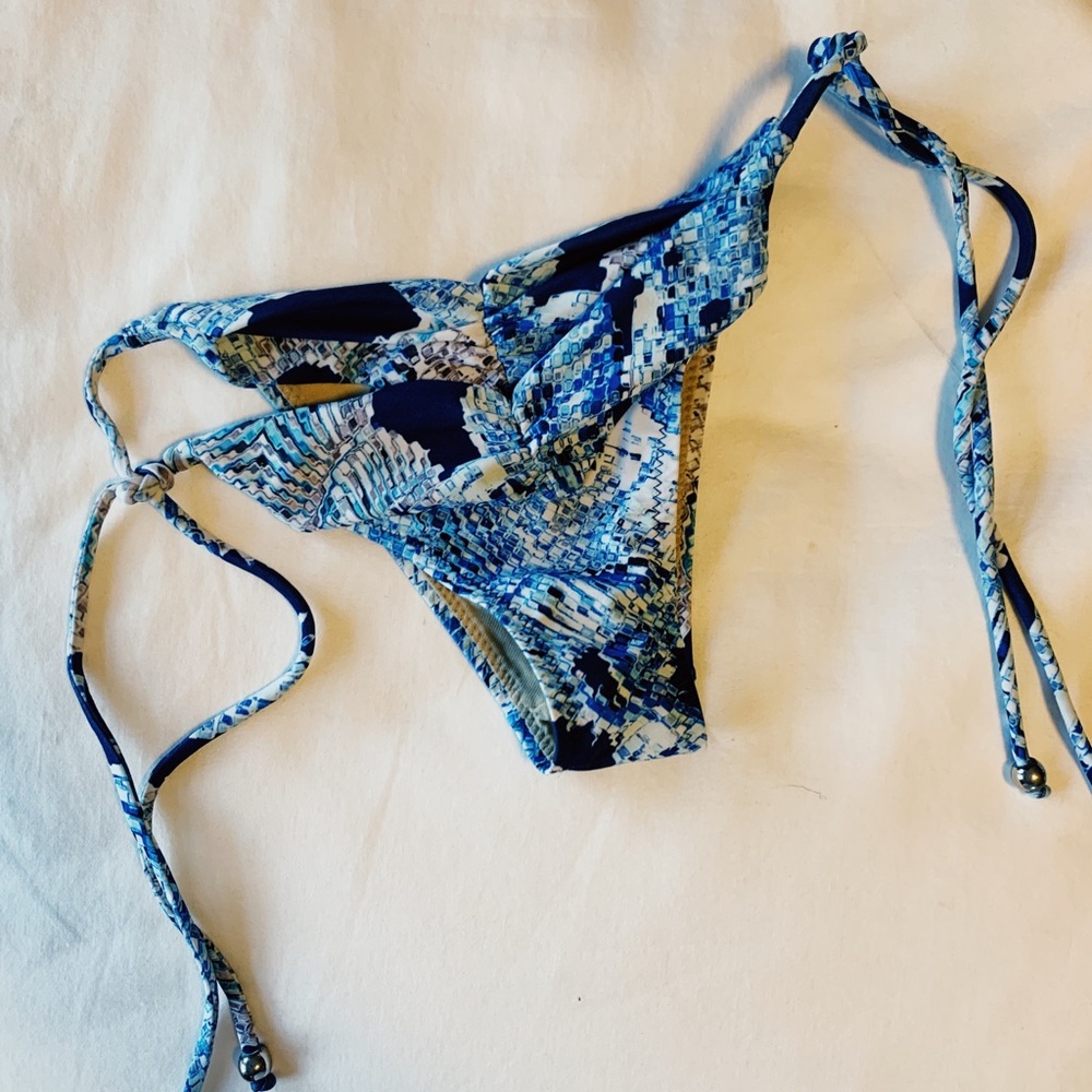 Cute Brazilian cut blue bikini bottom.